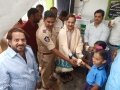 Water served by  Dr.Umar Alisha, Chairman of UARDT and Abdhul Nabhi (Sub Inspector of Polic, Pithapuram)  during inauguration of RO water plant at  R.R.BH.R GOVT HIGH SCHOOL, Pithapuram