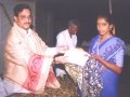 In A Umar Alisha AksharaJyothi Programme held on 30-May-2000 at Raghavapuram village of East Godavari District the Chairman UARDT while distrubuting Ist prize to the confirmed literate of the centre.