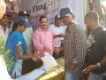 DR Umar Alisha, chairman, Umar Alisha Rural Development Trust distributing free SWINE FLU Preventive Homoeo medicine at VISAKHA UTSAV on 24 Jan 2015 at RK beach