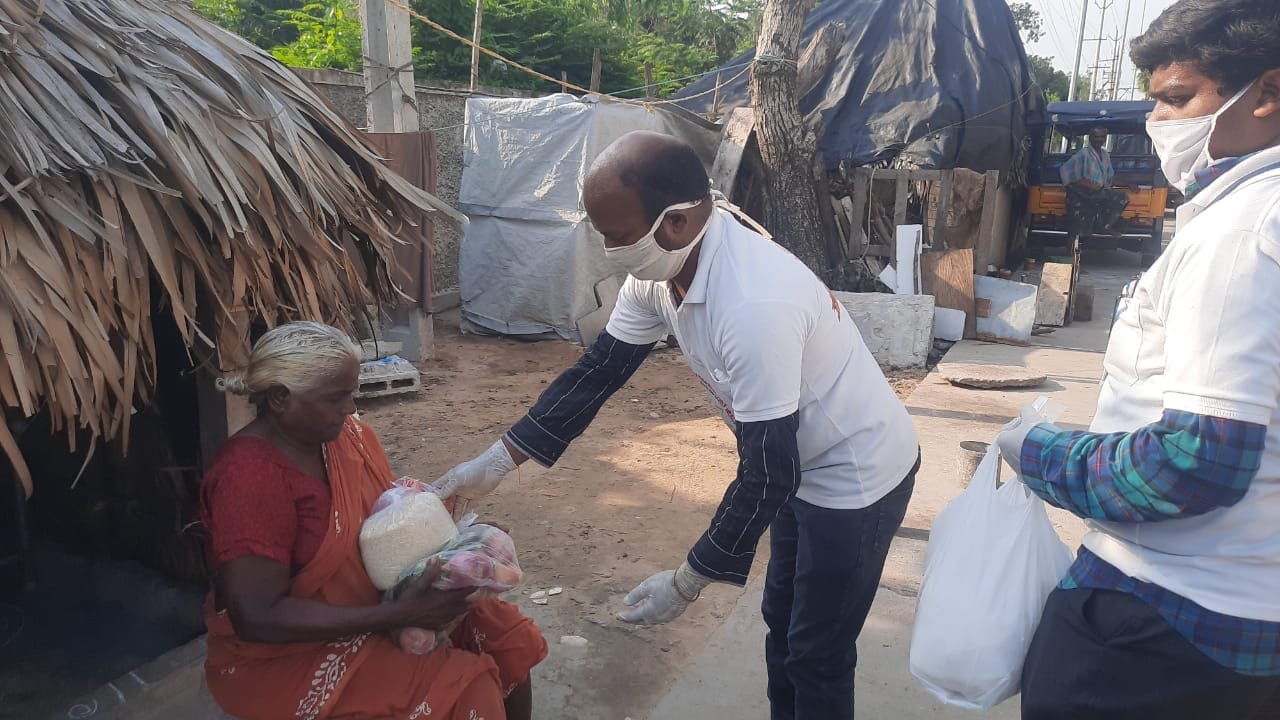 UARDT distributed Coronavirus preventive Homeo Medicine, Groceries and Vegetables at JNTU back side, Kakinada on 02-May-2020