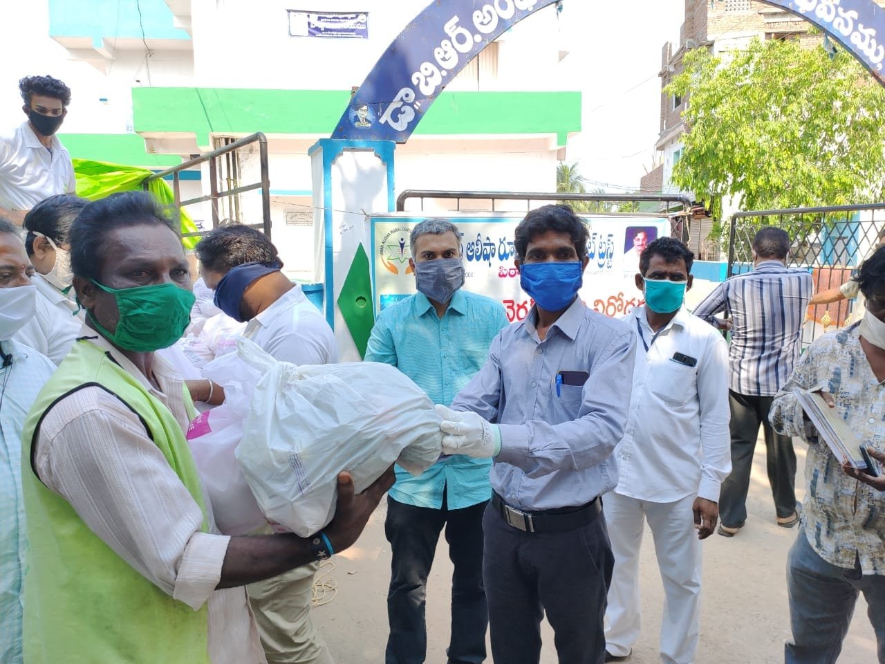 UARDT distributed Coronavirus preventive Homeo medicines, Vegetables, Rice and groceries to Sanitary staff in Tagarapuvalsa, Bheemili, Visakhapatnam on 1-May-2020