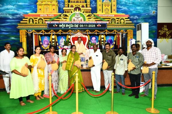 Clothes distribution to volunteers and sheaves of grain for birds on Karthika pournami