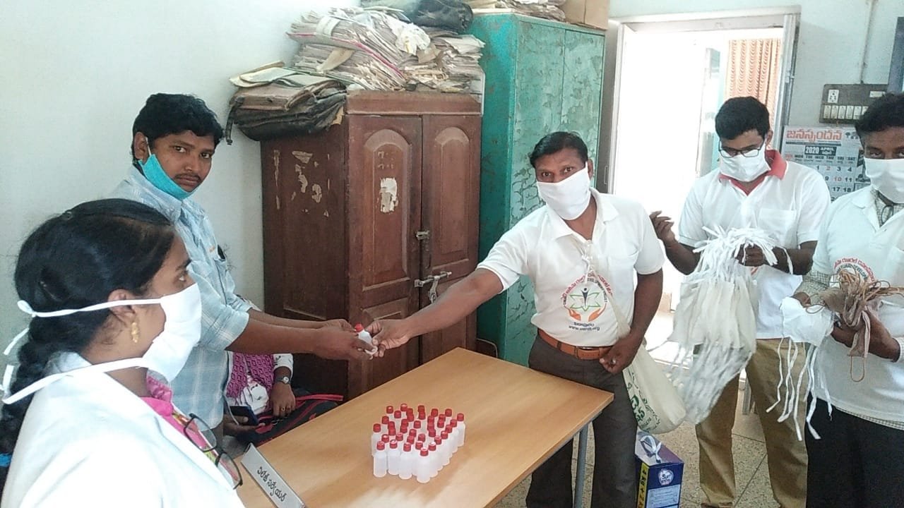 Coronavirus preventive medicine, Masks and Sanitization bottles distributed at Grama Sachivalayam, Bommuru, Rajahmundry Rural on 18-Apr-2020