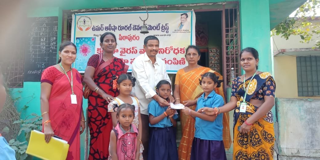 Coronavirus preventive medicine distributed by UARDT to Teachers, Staff, Students and Parents at Mandal Parishad Elementary School, Undarajavaram on 27-Feb-2020