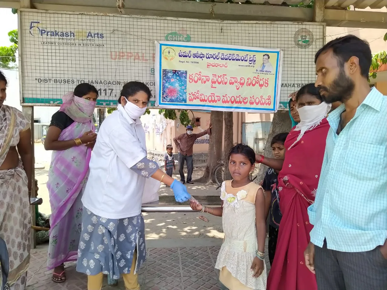 Coronavirus preventive medicine distributed at UPPAL Cross Roads Bus Stop, Vegetable Markets, Hyderabad on 12-Apr-2020