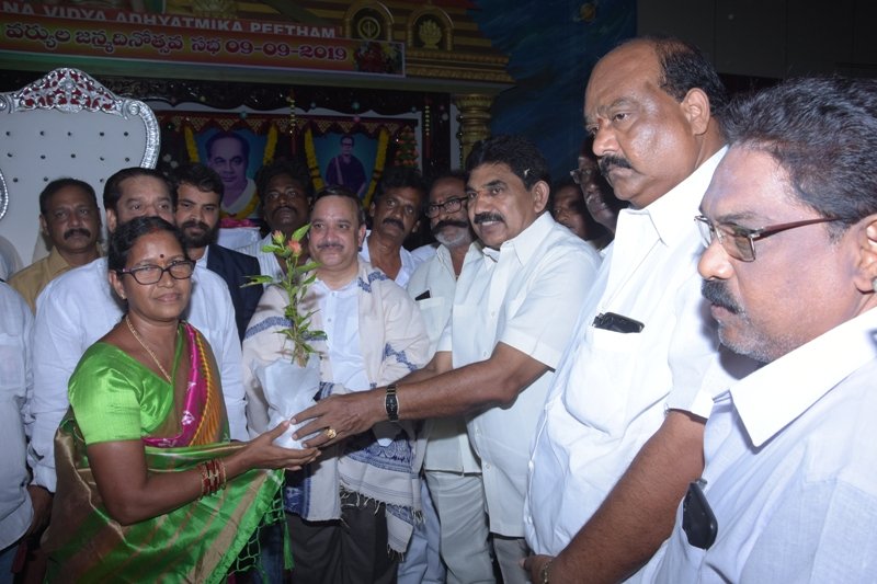 Sewing machine and plants distributed by U.A.R.D.T in the occasion of Sathguru Hussainsha Birthday sabha